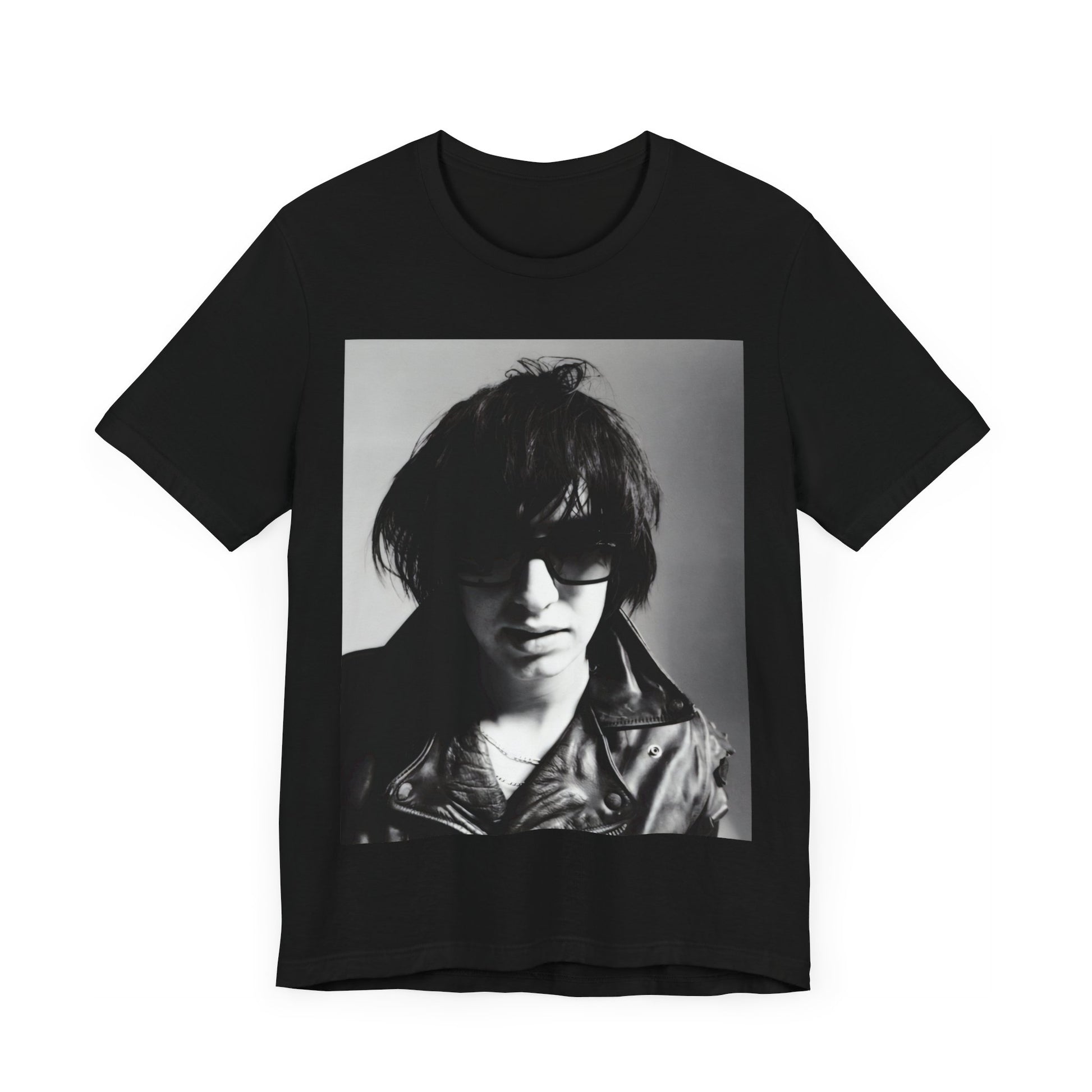 A black graphic t-shirt featuring a graphic related to The Strokes' 'Reptilia' song or era.