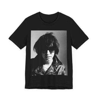 A black graphic t-shirt featuring a graphic related to The Strokes' 'Reptilia' song or era.
