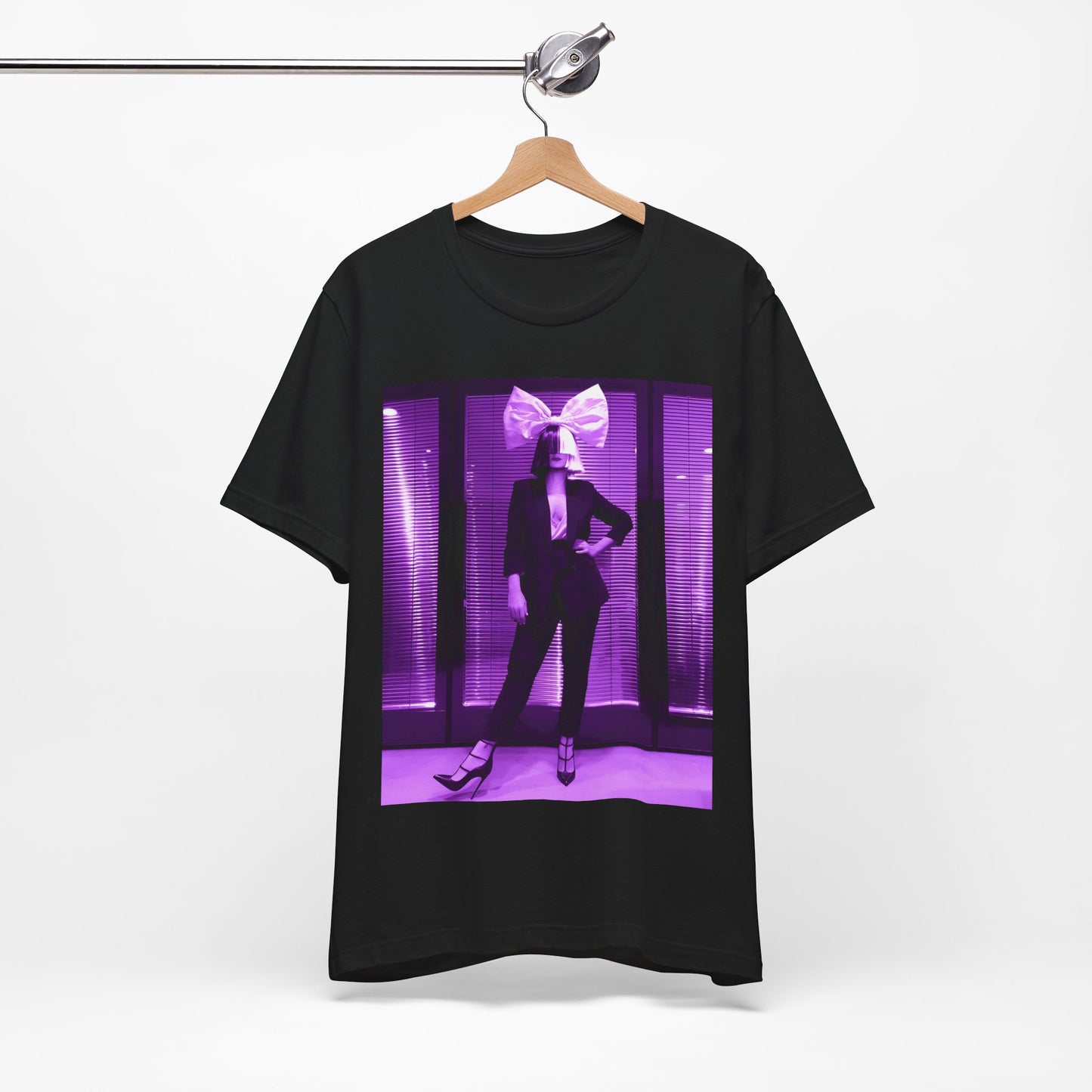 A black graphic t-shirt featuring a vintage pop diva graphic of Sia.