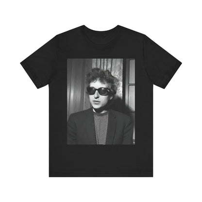 A black graphic t-shirt featuring a graphic related to Bob Dylan's 'The Freewheelin' album era.