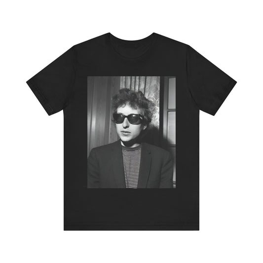 A black graphic t-shirt featuring a graphic related to Bob Dylan's 'The Freewheelin' album era.