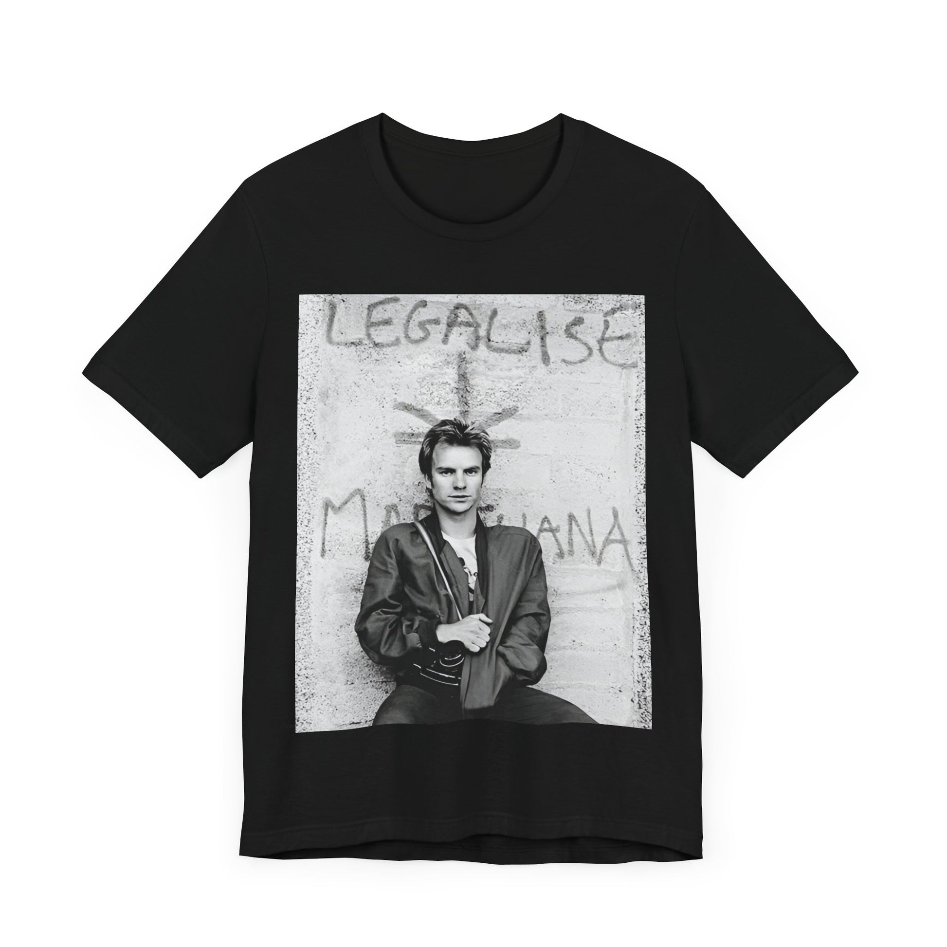 A black graphic t-shirt featuring a graphic of The Police with reggae-influenced pop elements.