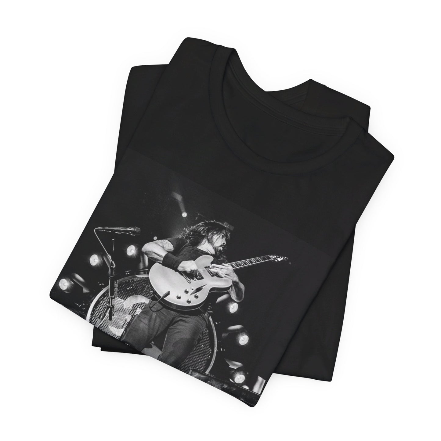 A black graphic t-shirt featuring a vintage photo of Foo Fighters performing live.