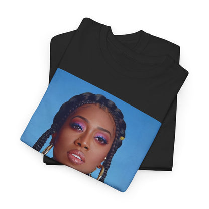 A black graphic t-shirt featuring a graphic of Missy Elliott with a cool, futuristic rap fashion aesthetic.