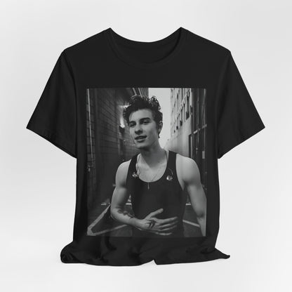 A black graphic t-shirt featuring a vintage black and white portrait graphic or photo of Shawn Mendes.