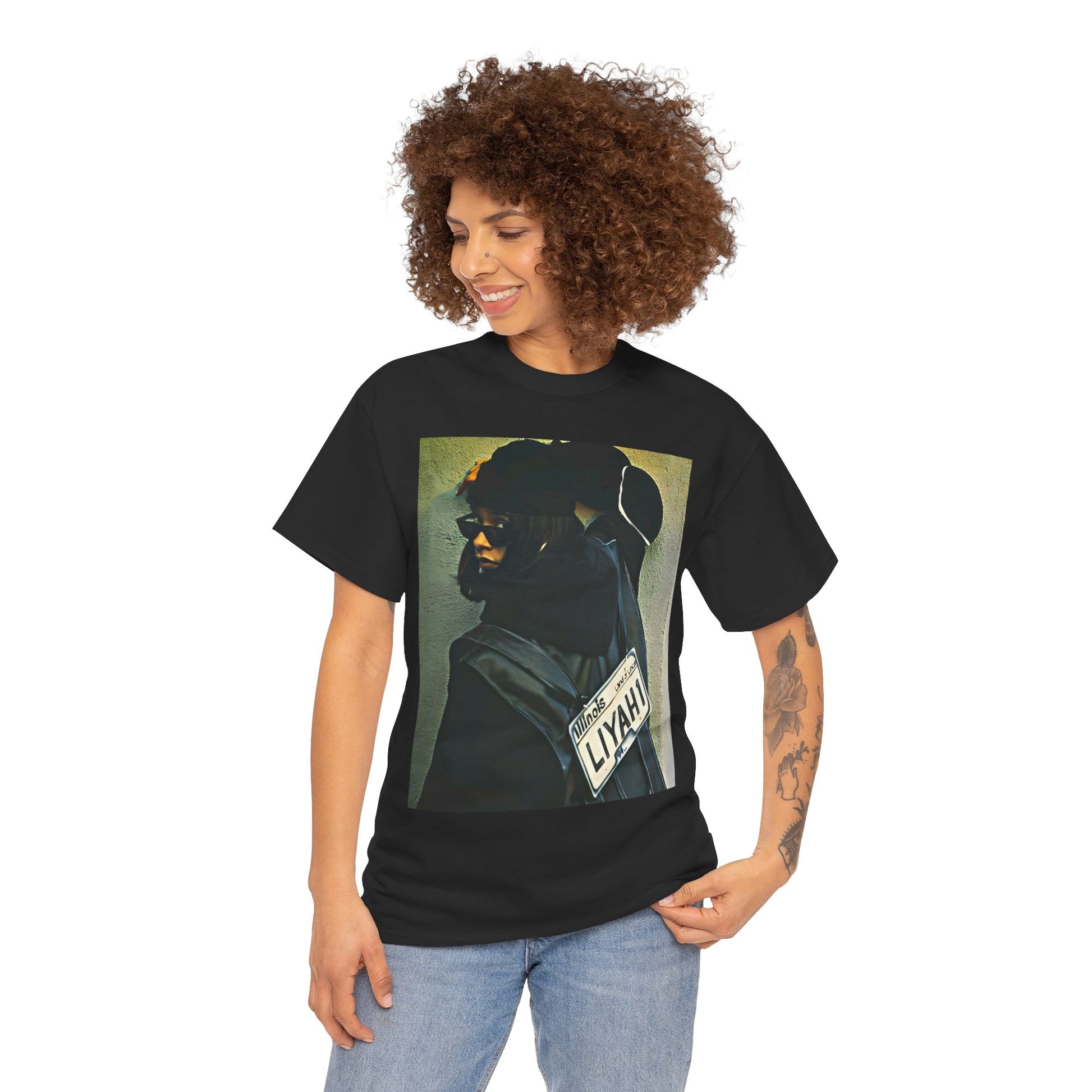 A black graphic t-shirt featuring a graphic of Aaliyah as the queen of urban rap legacy.