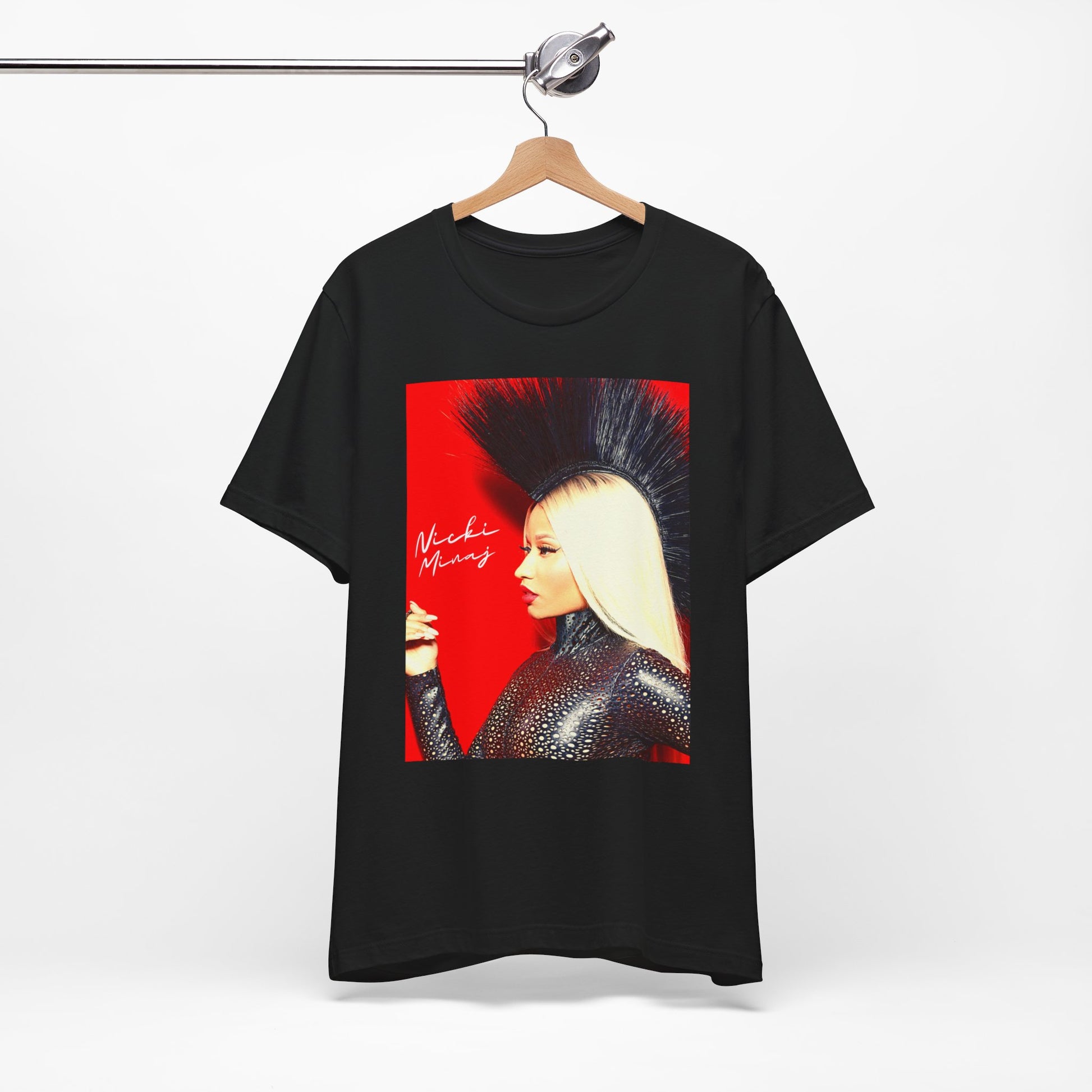 A black graphic t-shirt featuring a graphic of Nicki Minaj as a female rap pioneer.