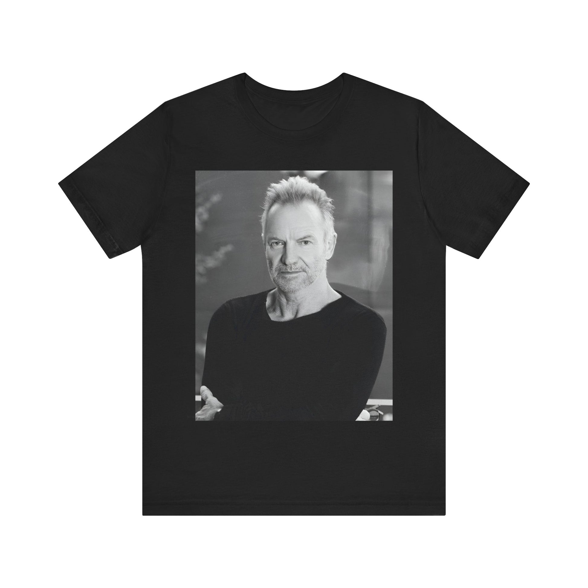 A black graphic t-shirt featuring a vintage graphic related to Sting's 'Desert Rose' song or era.
