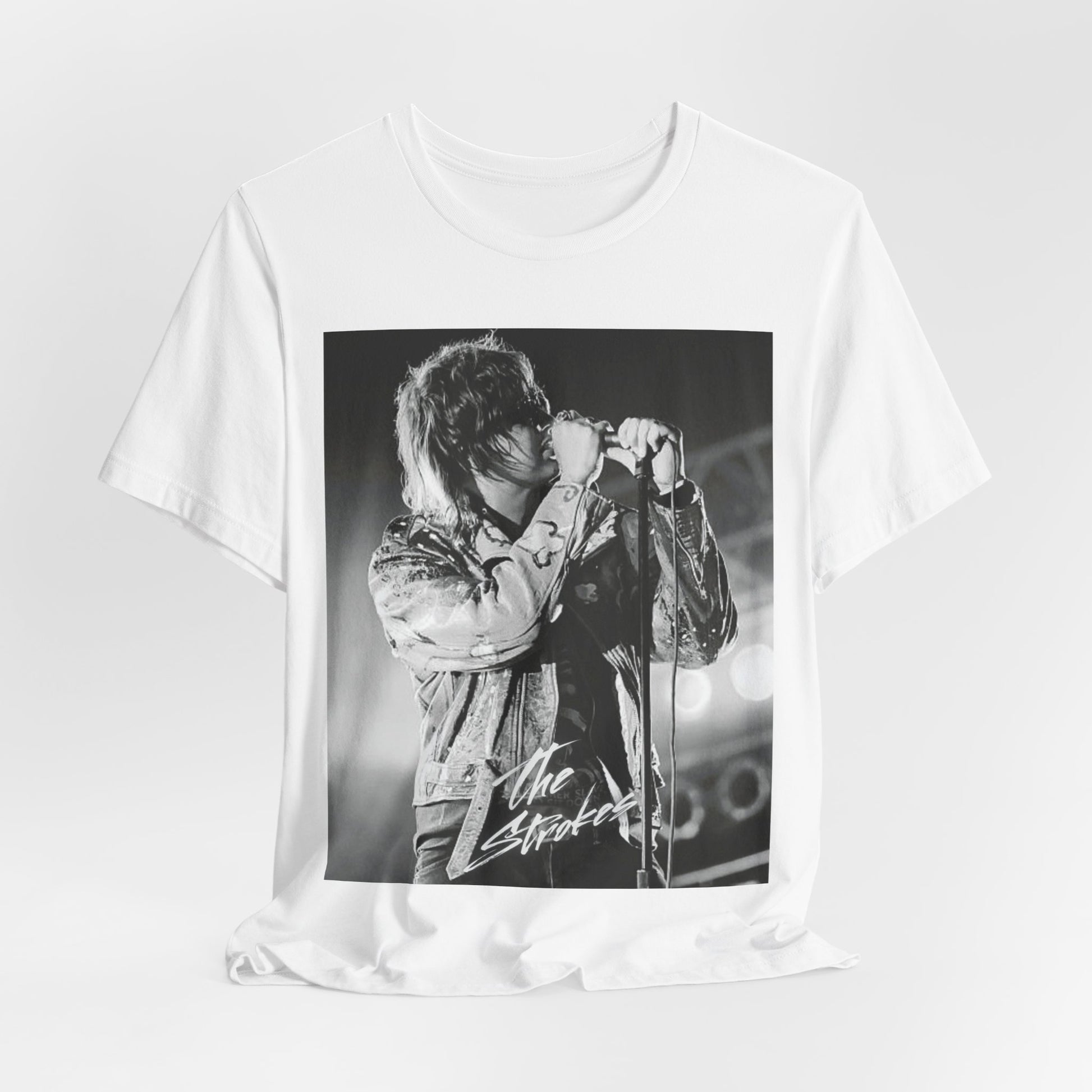 A black graphic t-shirt featuring a vintage graphic related to The Strokes' 'Last Nite' song or era.