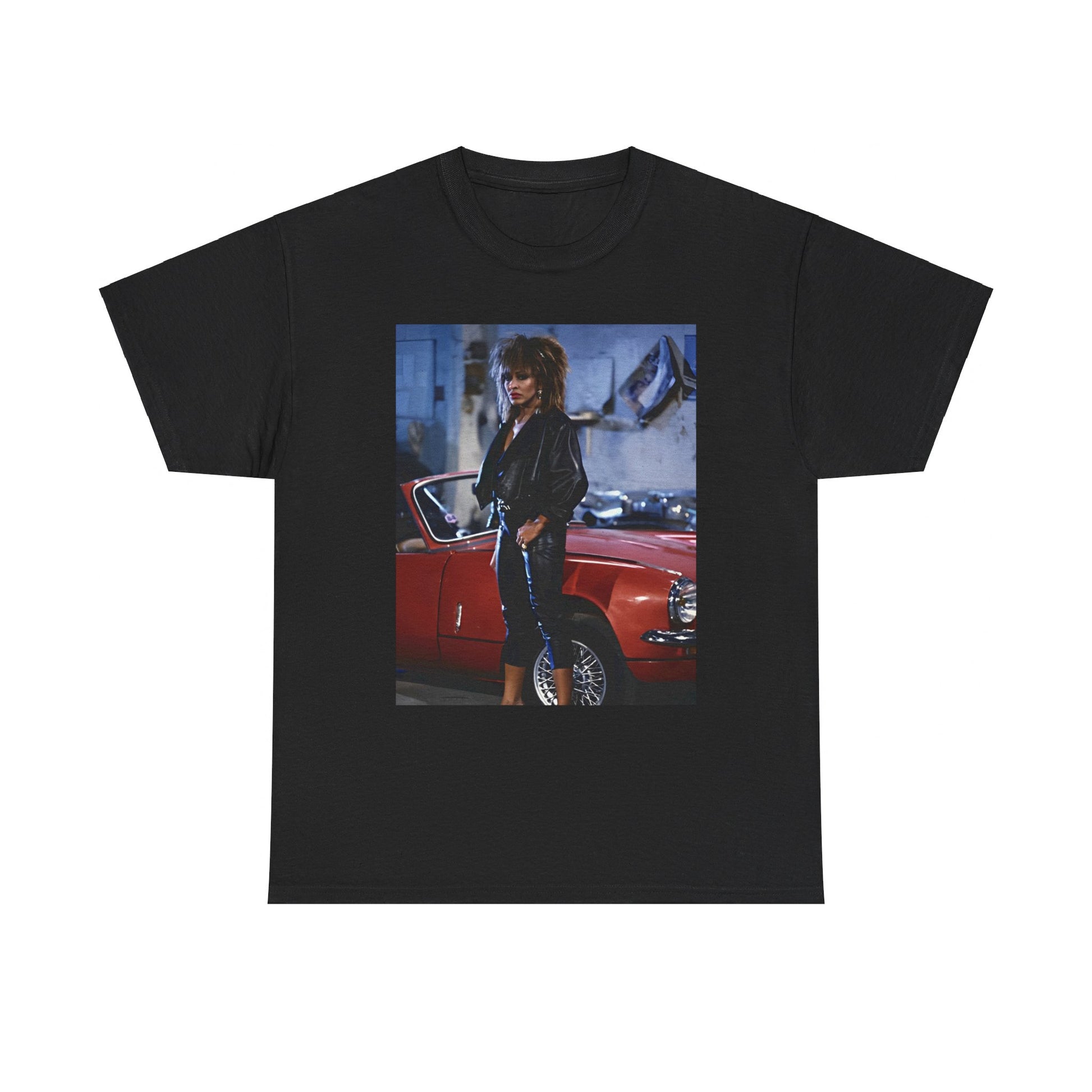 A black graphic t-shirt featuring an 80s graphic of Tina Turner as a powerful rock woman.