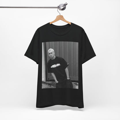 A black graphic t-shirt featuring a graphic of Eminem with a Detroit hip hop aesthetic.