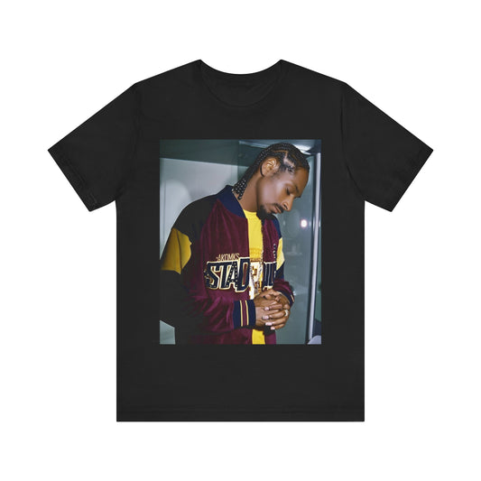 A black graphic t-shirt featuring a classic graphic of Snoop Dogg with a cool gaze.