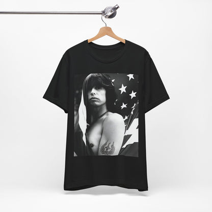 A black graphic t-shirt featuring a retro 70s-style illustration or photo of Aerosmith, integrated with elements of the American flag.