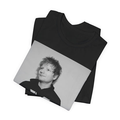 A black graphic t-shirt featuring a black and white graphic related to Ed Sheeran's album 'X'.