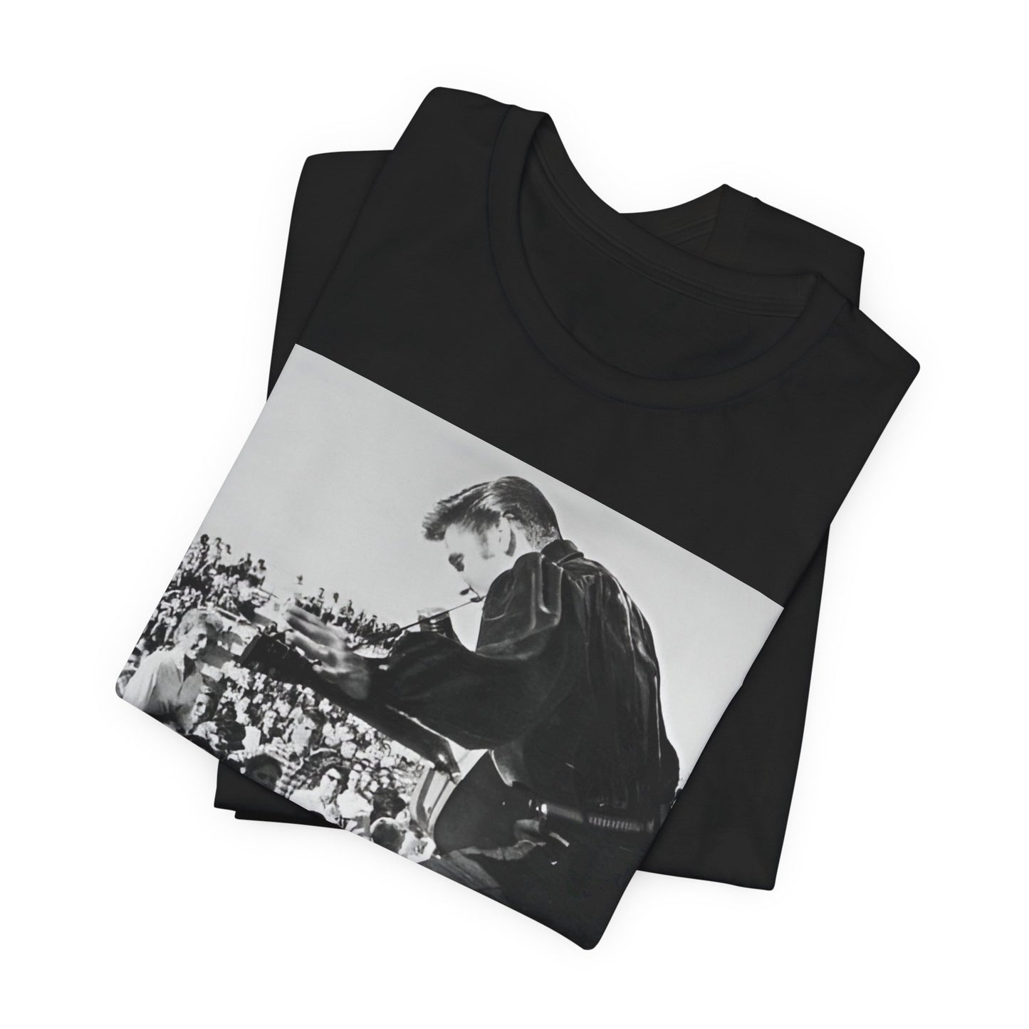 A black graphic t-shirt featuring a retro photo of Elvis Presley performing live in concert in the 1950s.