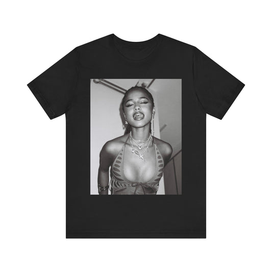 A black graphic t-shirt featuring a black and white, monochrome graphic or photo of Tyla.