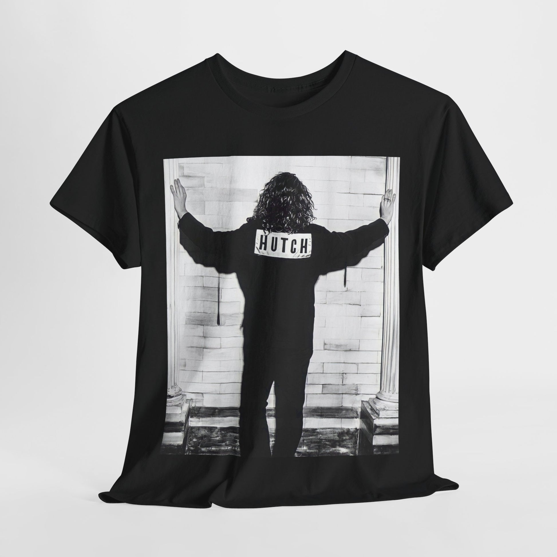 A black graphic t-shirt featuring a graphic of Michael Hutchence from INXS, labeled 'Hutch'.