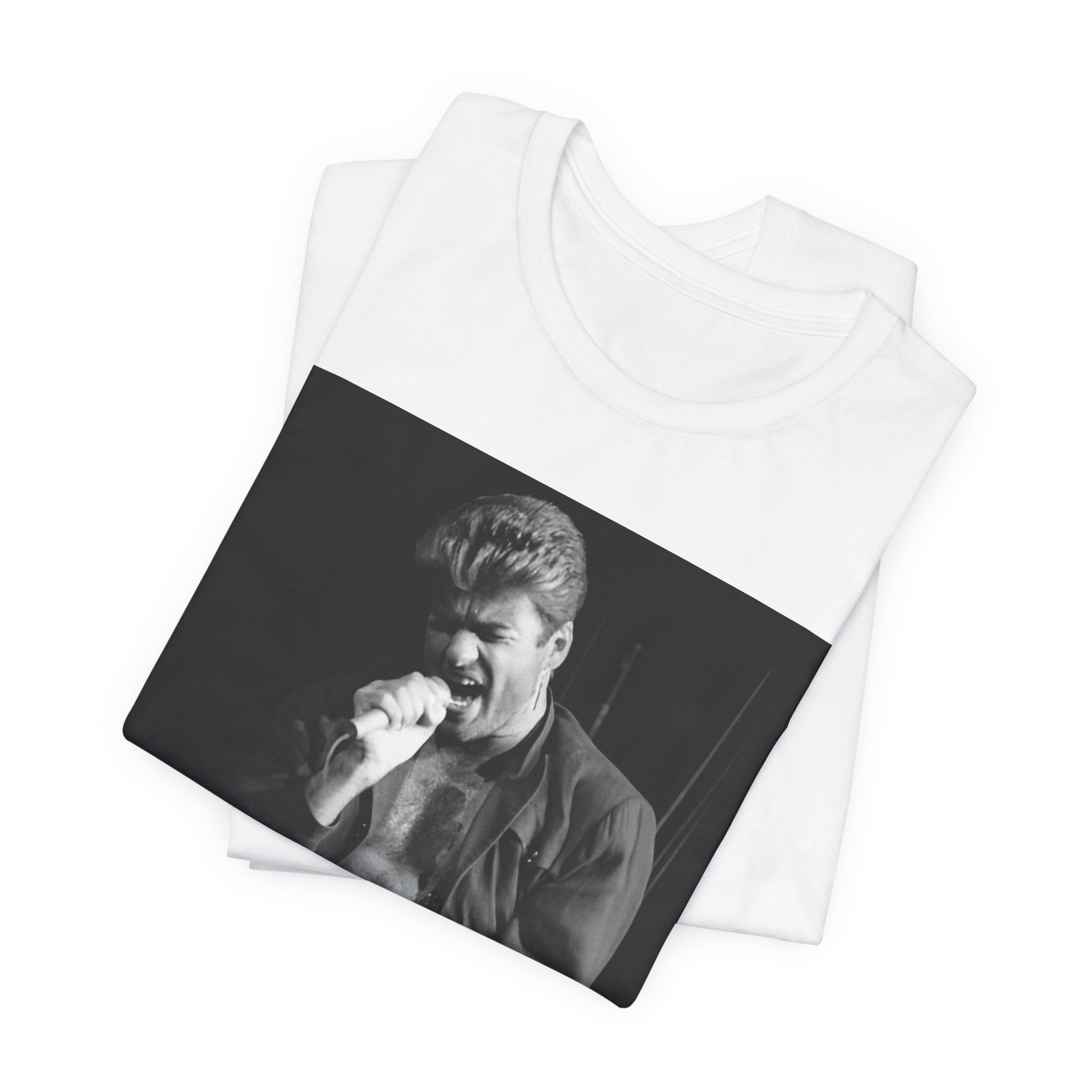 A black graphic t-shirt featuring a glamorous photo or graphic of George Michael performing live.
