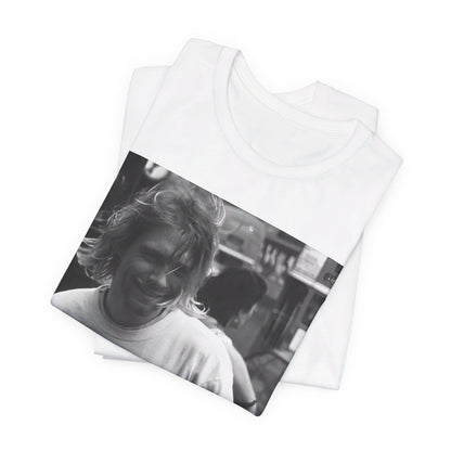 A black graphic t-shirt featuring a vintage rock legends graphic of Nirvana.