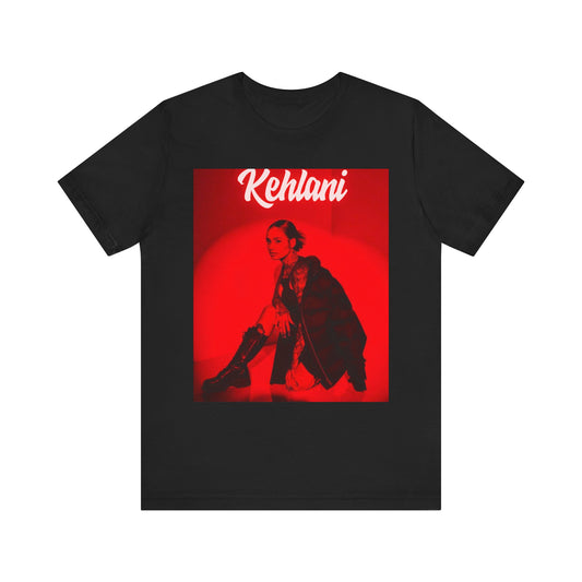 A black graphic t-shirt featuring a photo of Kehlani with a prominent red aesthetic or red lighting.