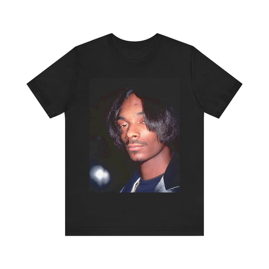 A black graphic t-shirt featuring a 90s black and white graphic of Snoop Dogg as a global icon in rap.