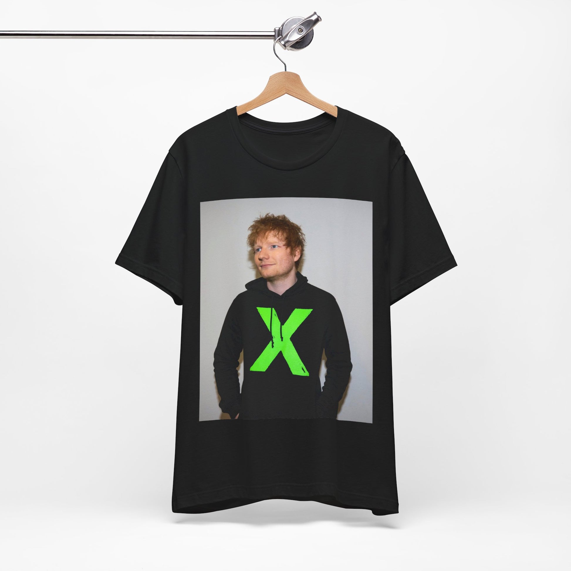 A black graphic t-shirt featuring an aesthetic graphic of Ed Sheeran related to his album 'X'.