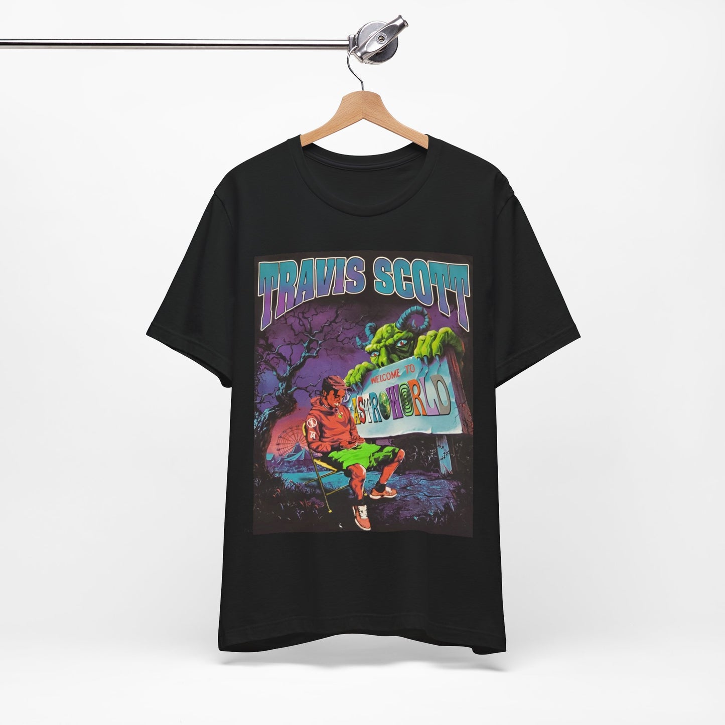 A black graphic t-shirt featuring a vintage graphic related to Travis Scott's Astroworld album.