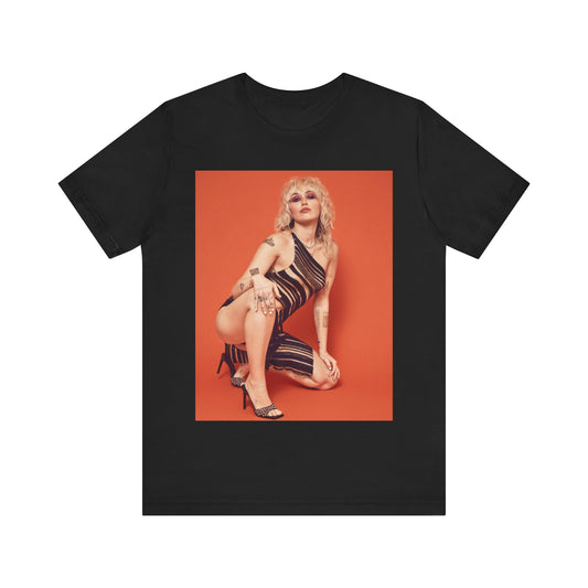 A black graphic t-shirt featuring a casual pop fan graphic of Miley Cyrus.