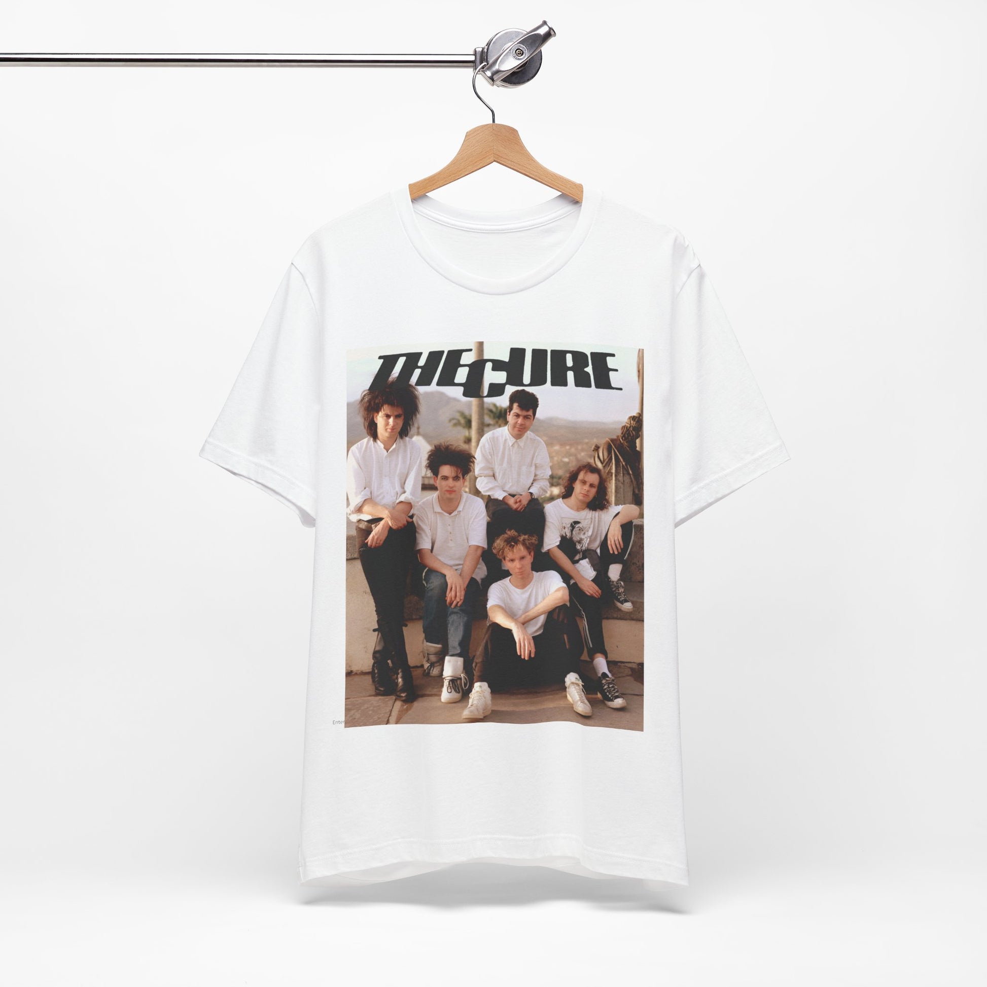A black graphic t-shirt featuring a vintage graphic of The Cure with a dark romanticism theme.