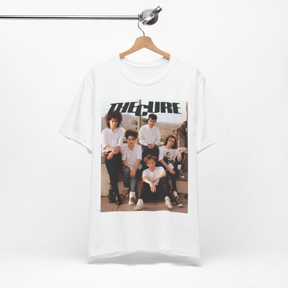 A black graphic t-shirt featuring a vintage graphic of The Cure with a dark romanticism theme.