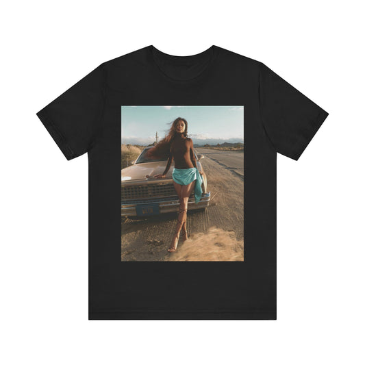 A black graphic t-shirt featuring a graphic of Tyla as an authentic African pop star.
