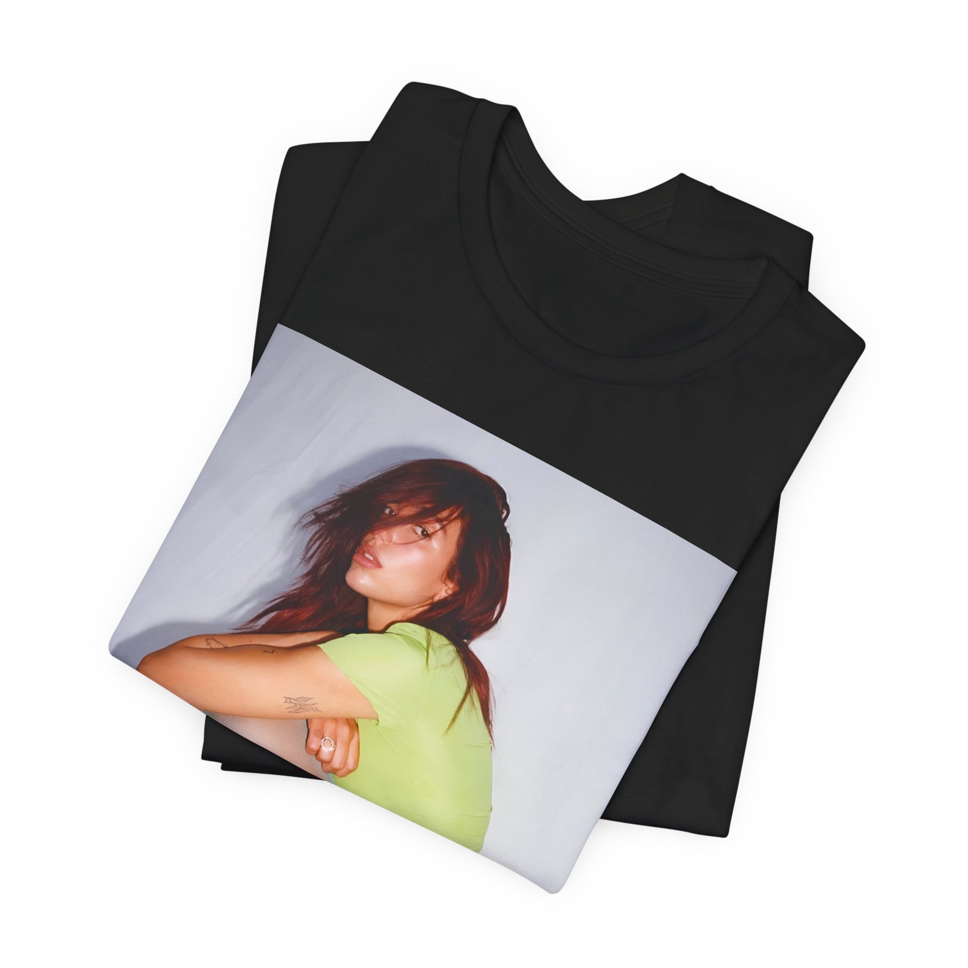 A black graphic t-shirt featuring a graphic inspired by Dua Lipa's 'Houdini' song.