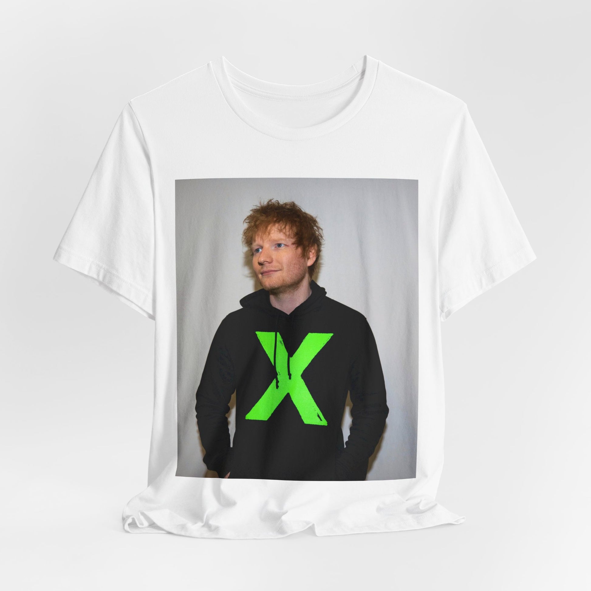 A black graphic t-shirt featuring an aesthetic graphic of Ed Sheeran related to his album 'X'.