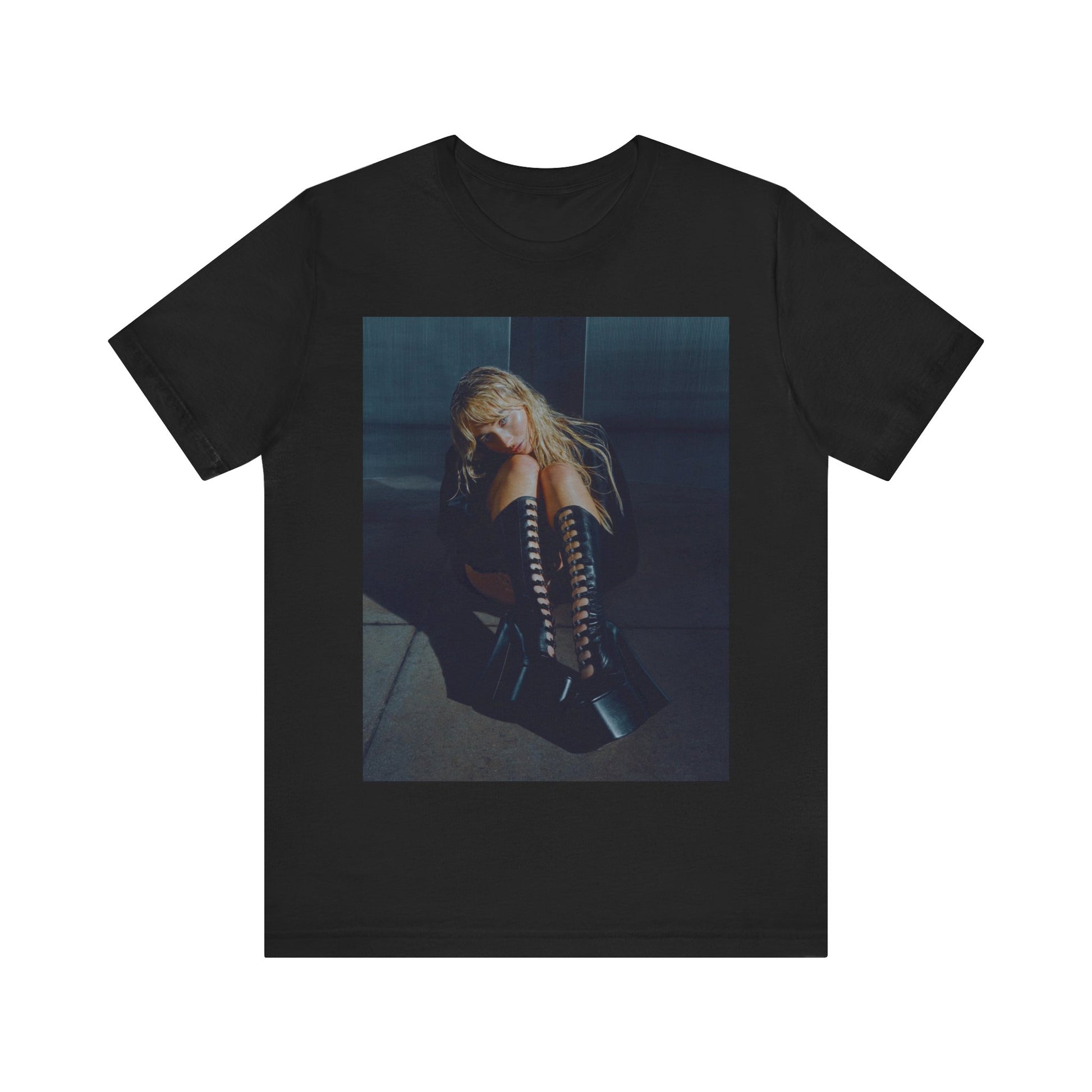 A black graphic t-shirt featuring a bold graphic of Sabrina Carpenter as a pop superstar.