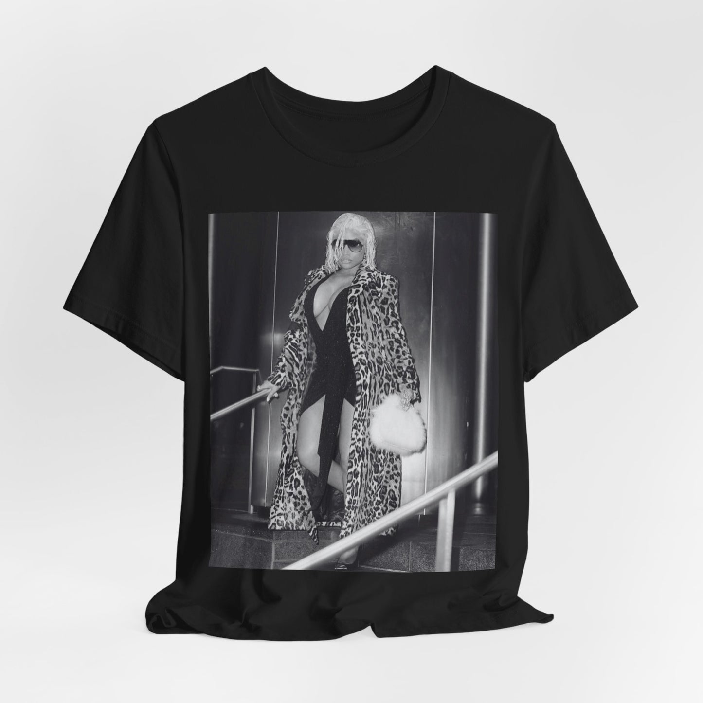 A black graphic t-shirt featuring a black and white glam aesthetic graphic of Nicki Minaj.