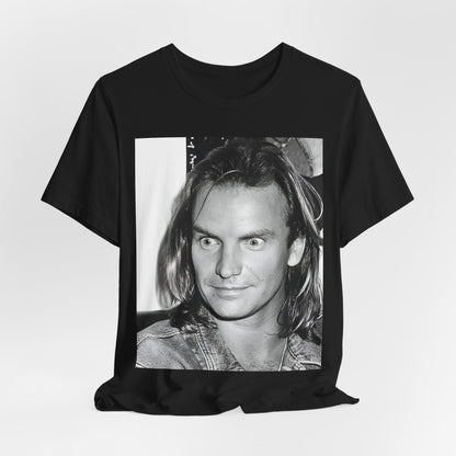 A black graphic t-shirt featuring a retro graphic related to Sting's 'Synchronicity' album era.