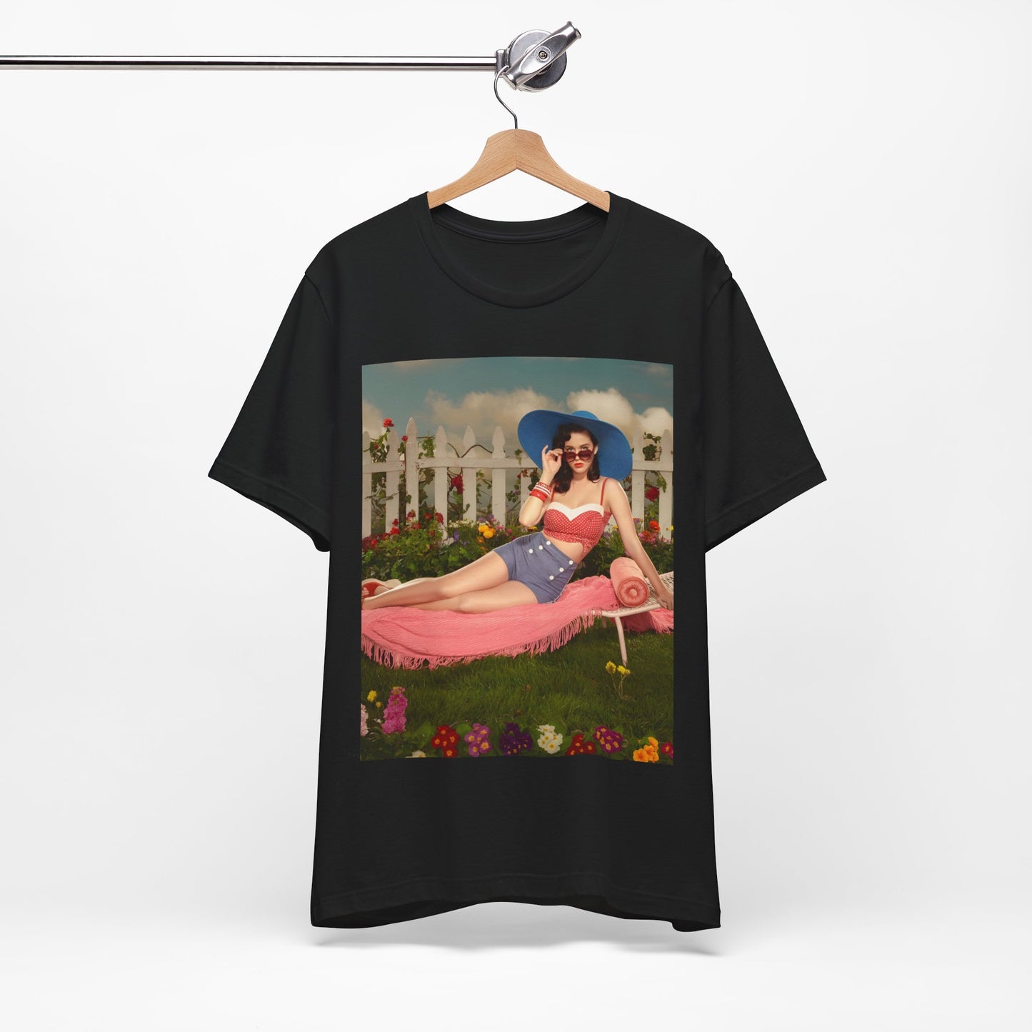 A black graphic t-shirt featuring a graphic related to Katy Perry's "California Gurls" song, with beach vibes.