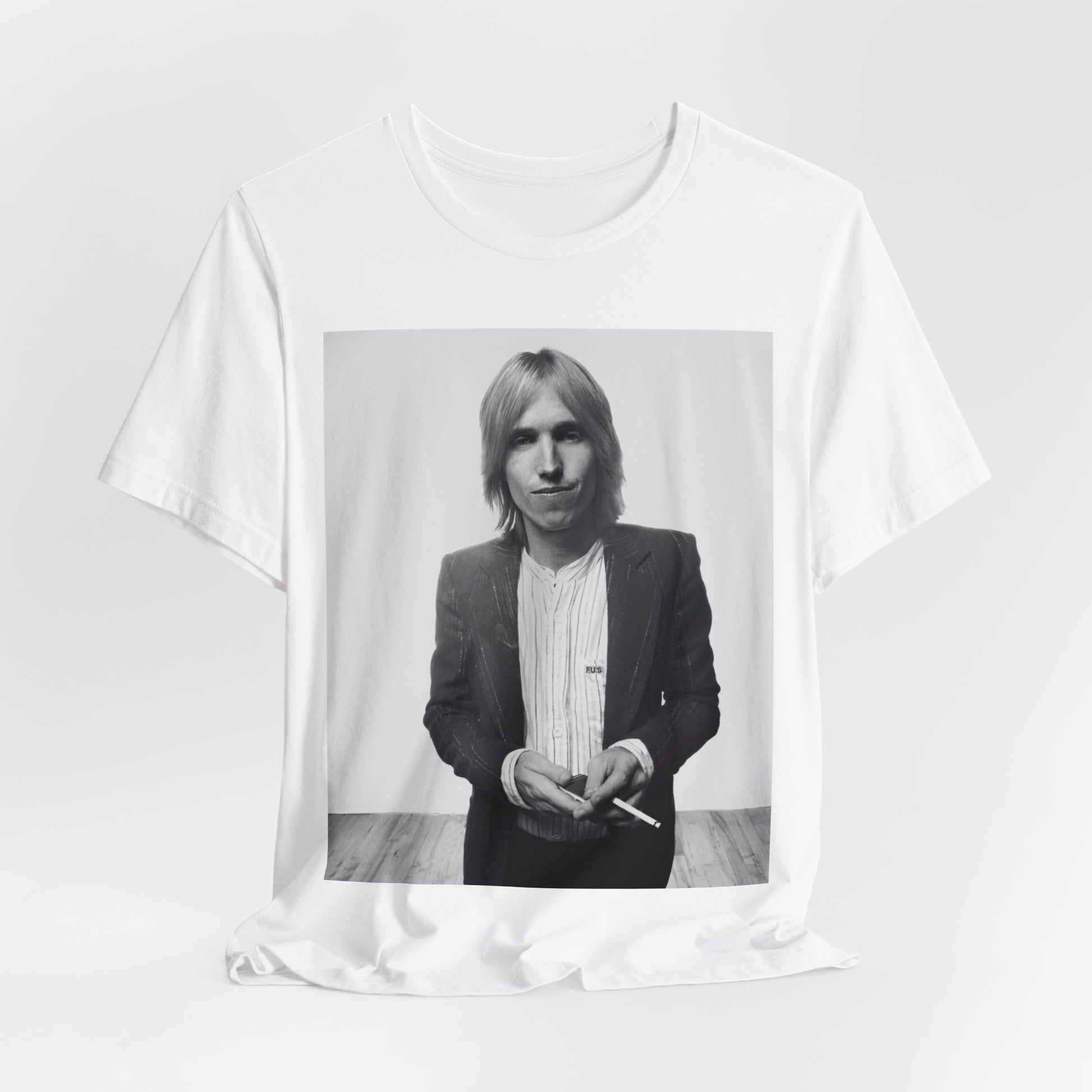 A black graphic t-shirt featuring a graphic of Tom Petty with rock legend vibes.