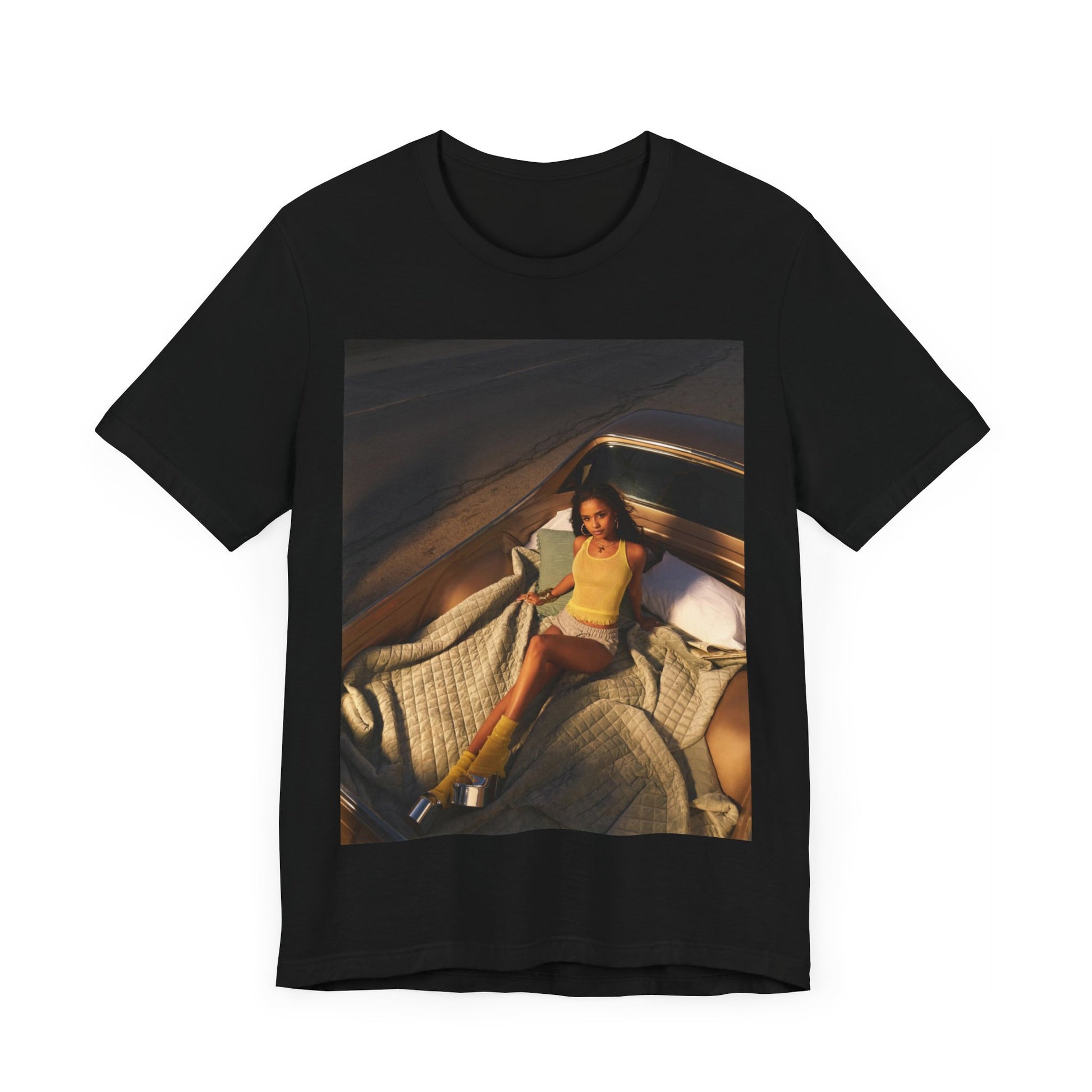A black graphic t-shirt featuring a graphic of Tyla as an African fashion icon.