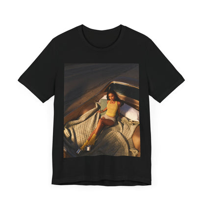 A black graphic t-shirt featuring a graphic of Tyla as an African fashion icon.