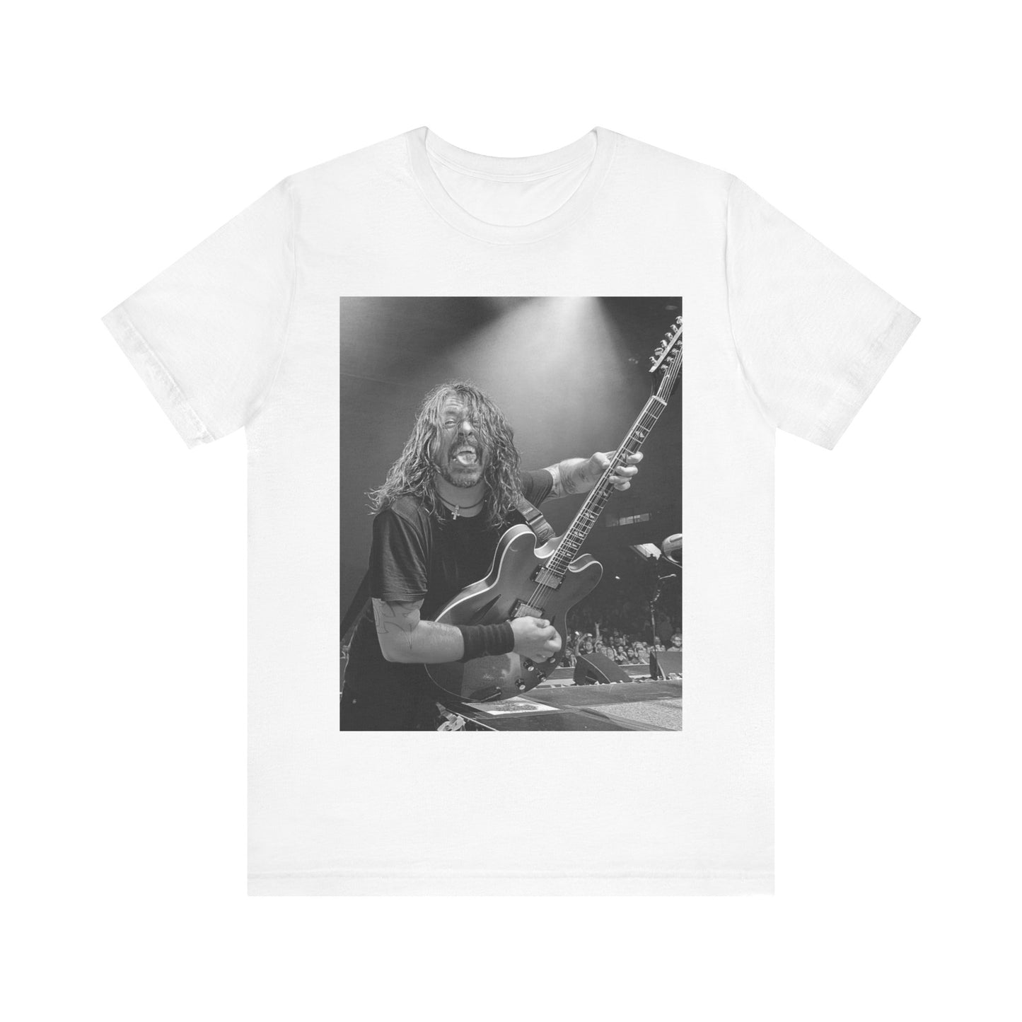 A black graphic t-shirt featuring a graphic of Dave Grohl from Foo Fighters playing guitar in concert.