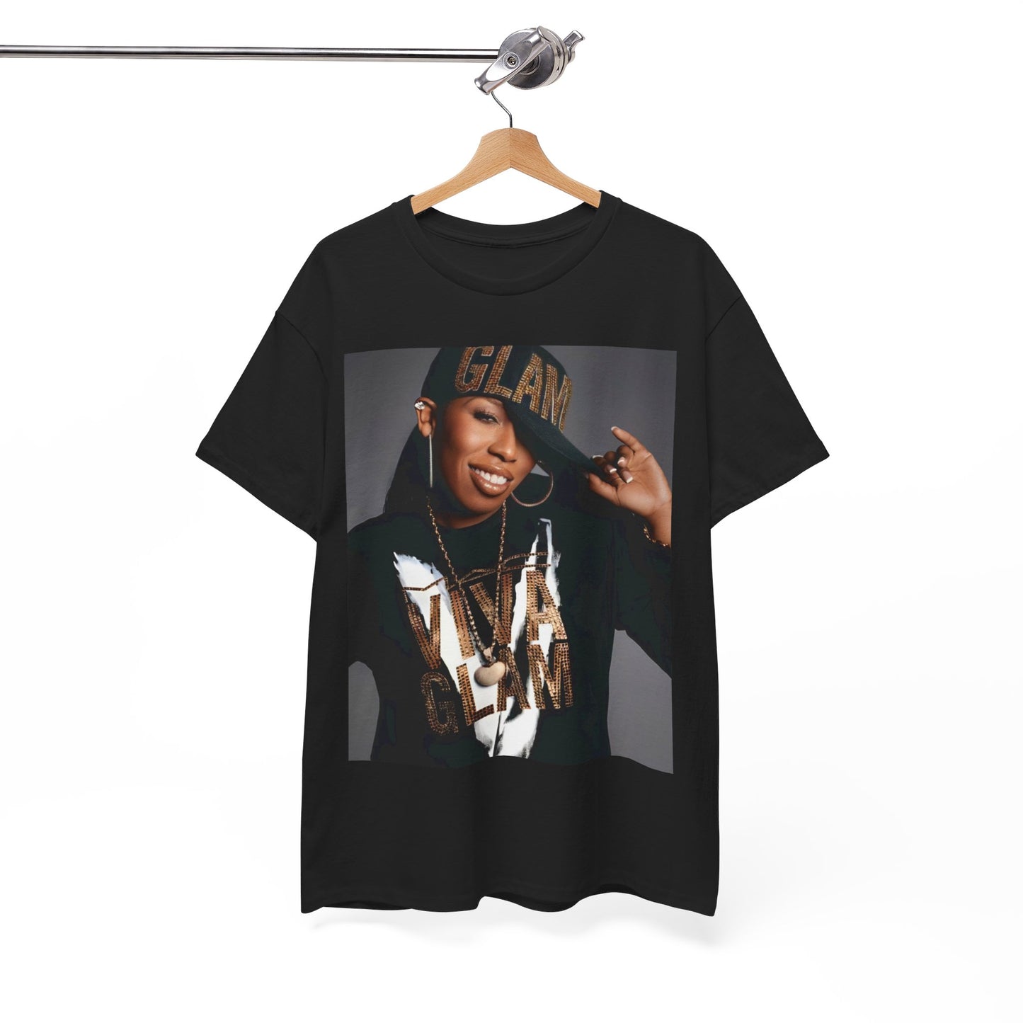 A black graphic t-shirt featuring a 90s graphic of Missy Elliott as a global rap phenomenon.
