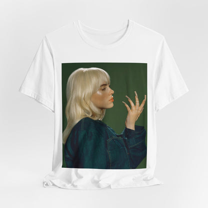 A vintage-style portrait of Billie Eilish with platinum blonde hair and long nails, wearing a denim jacket against a green background.