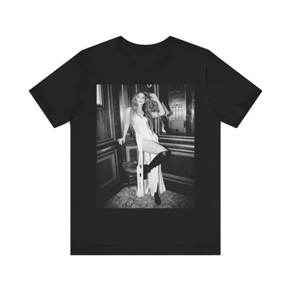 A black graphic t-shirt featuring a retro black and white monochrome graphic or photo of Shakira.
