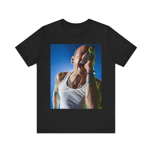 A black graphic t-shirt featuring a retro graphic of Linkin Park performing live.