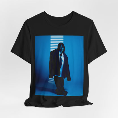 A high-fashion, editorial-style photo of Billie Eilish, embodying a 'breaking the rules' attitude, printed on a graphic t-shirt.
