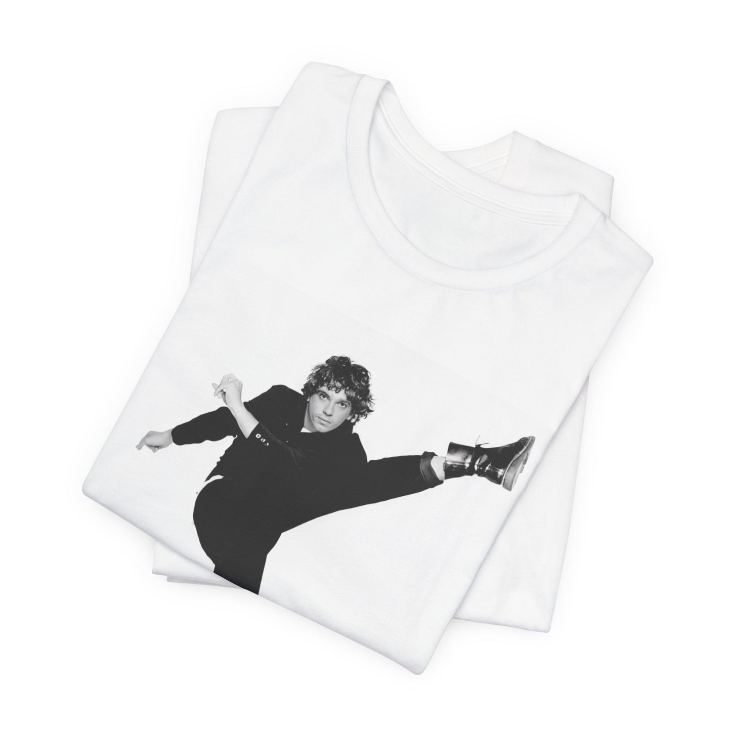A black graphic t-shirt featuring a retro graphic related to INXS's 'Kick' album era.