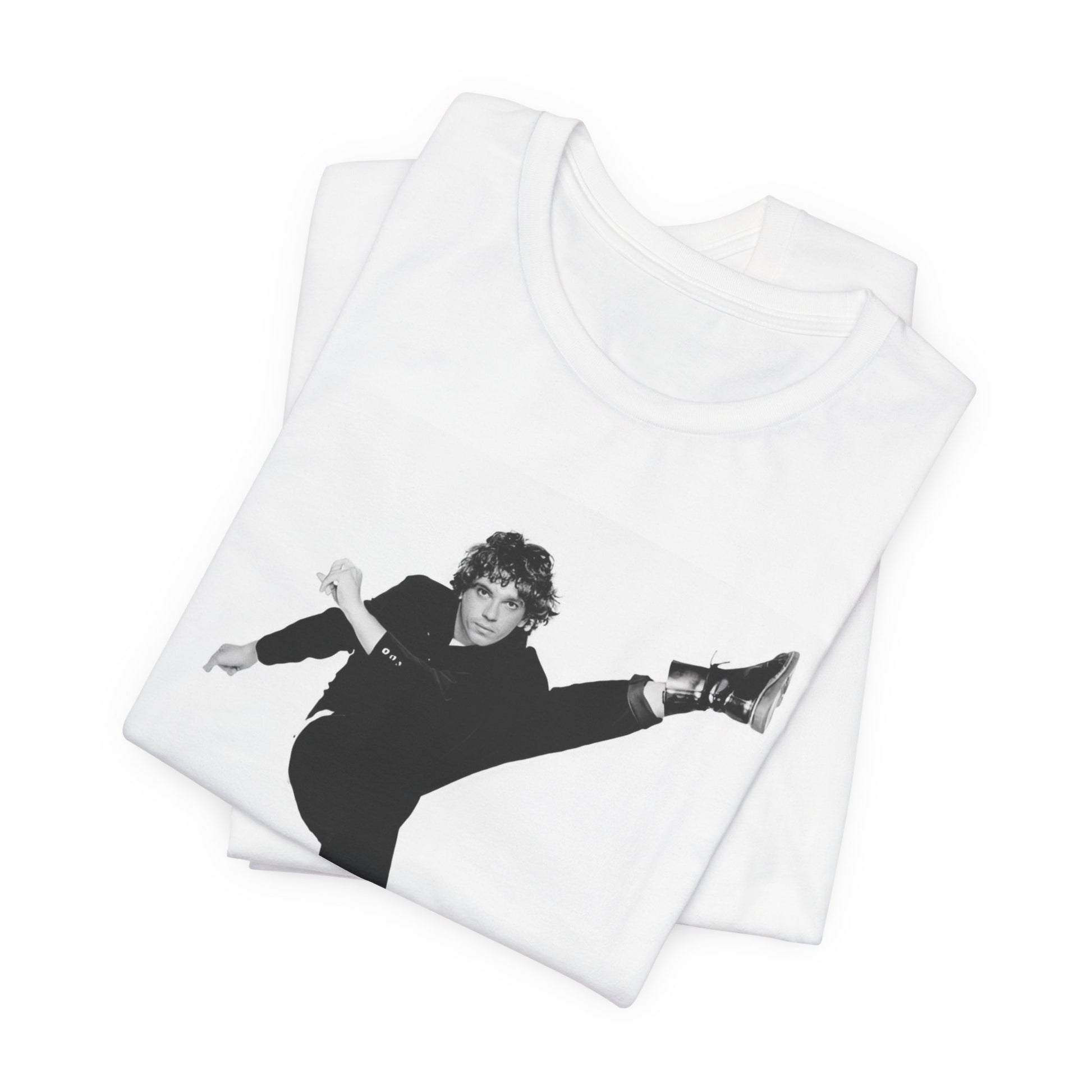 A black graphic t-shirt featuring a retro graphic related to INXS's 'Kick' album era.