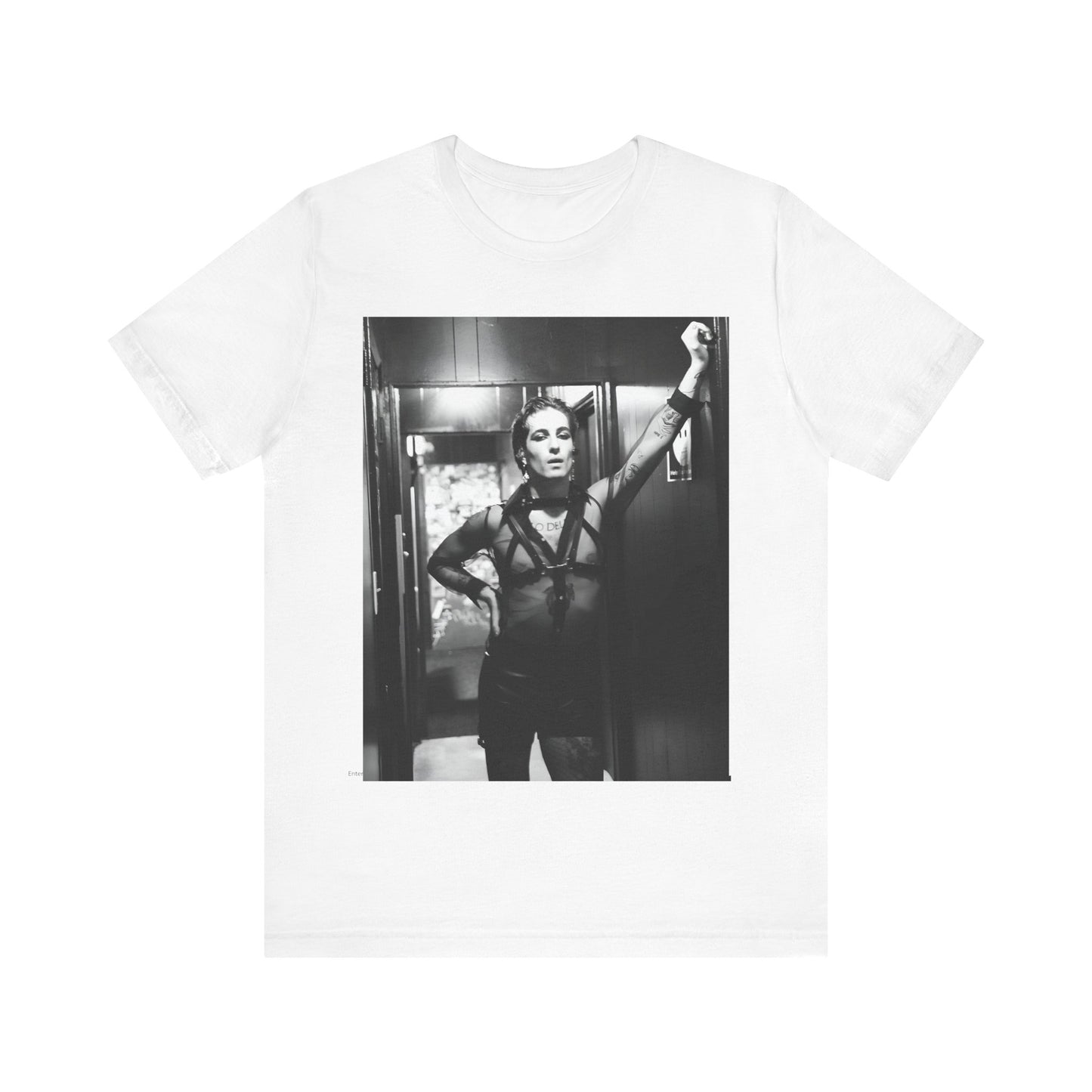 A black graphic t-shirt featuring a graphic of Maneskin emphasizing a rebel rock spirit.