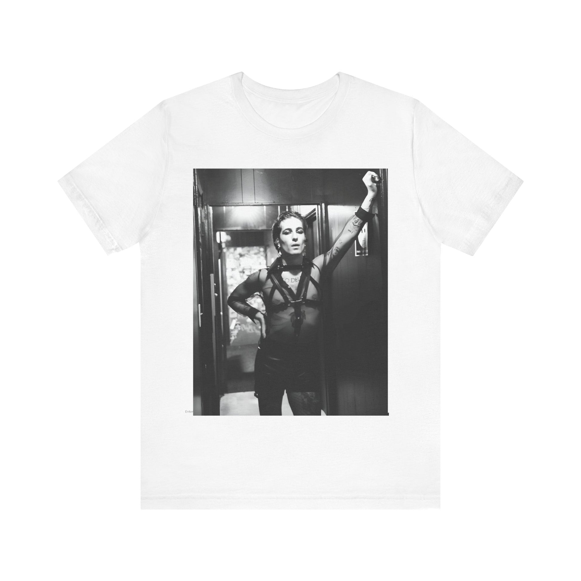 A black graphic t-shirt featuring a graphic of Maneskin emphasizing a rebel rock spirit.